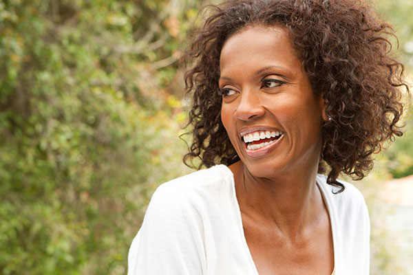 woman smiling after Zoom teeth whitening from East Village Dental Centre in Chicago, IL