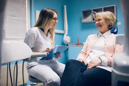 Woman talking to doctor